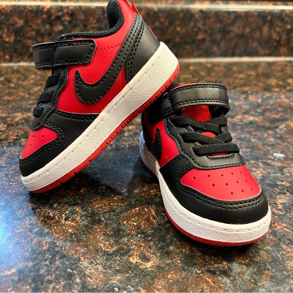 Nike Red and Black Sneakers with Classic Design